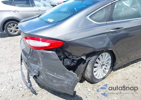 2015 Ford Fusion Energi Se Luxury z USA, uszkodzony, nr VIN 3FA6P0PU1FR255530